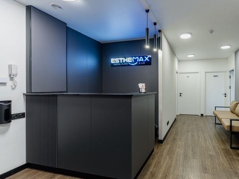 Reception at ESTHEMAX in Yerevan, under the lit clinic sign